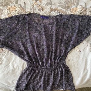 Miley Cyrus dressed up top